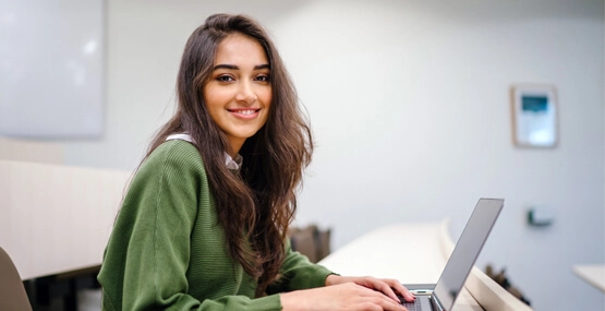 Student studying on laptop